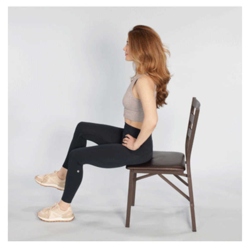 In the basic seated stretch, a person stretches each leg while keeping their back straight.