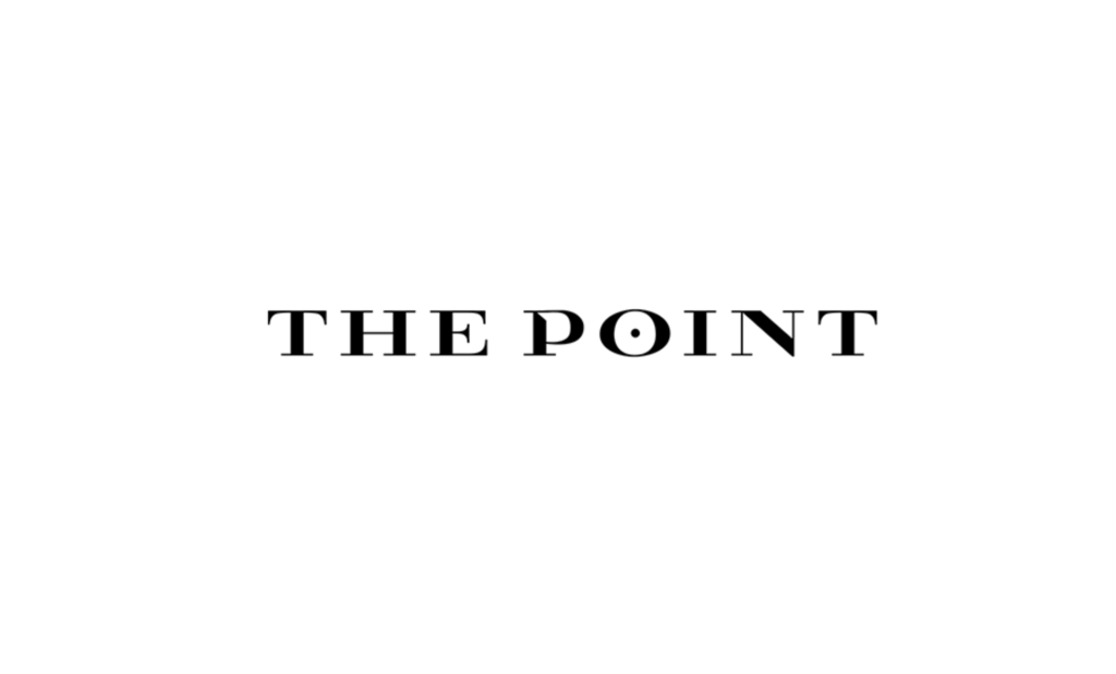Therapist performing trigger point therapy by applying pressure to a specific sensitive point on the body.